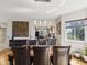 Dining area with hardwood floors and a view into the modern kitchen at 12033 Gandy N Blvd # 131, St Petersburg, FL 33702