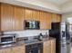 Kitchen with stainless steel appliances and granite countertops at 12033 Gandy N Blvd # 131, St Petersburg, FL 33702