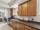 Kitchen featuring stainless steel appliances, granite counters, and tile floors at 12033 Gandy N Blvd # 131, St Petersburg, FL 33702