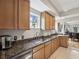 Kitchen featuring granite counters, stainless steel appliances, and ample cabinetry at 12033 Gandy N Blvd # 131, St Petersburg, FL 33702