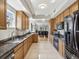 Spacious kitchen with granite countertops and stainless steel appliances at 12033 Gandy N Blvd # 131, St Petersburg, FL 33702