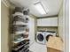 Laundry room with lots of basket storage and a folding table at 12033 Gandy N Blvd # 131, St Petersburg, FL 33702