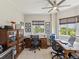 Bright office space with two desk areas, natural light, and storage cabinets at 12033 Gandy N Blvd # 131, St Petersburg, FL 33702