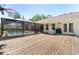 Expansive deck and a pool in a screened-in enclosure are ideal for relaxation and entertainment at 12503 Bronco Dr, Tampa, FL 33626