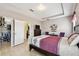 Comfortable bedroom featuring a spacious closet, and pleasant decor at 13312 Waterford Castle Dr, Dade City, FL 33525