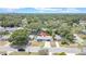 Scenic aerial view of the home nestled in a neighborhood with mature trees at 1416 Murray Ave, Clearwater, FL 33755