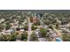 Aerial view capturing the homes location within a neighborhood with nearby water feature at 1416 Murray Ave, Clearwater, FL 33755