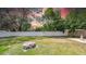 Backyard featuring a cozy fire pit for outdoor enjoyment at 1416 Murray Ave, Clearwater, FL 33755