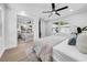 Bright bedroom with large windows and mirrored closet at 1416 Murray Ave, Clearwater, FL 33755