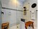 Beautiful bathroom boasts a glass enclosed shower with gray and white tiling at 14975 Renaissance Ave, Odessa, FL 33556