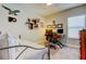 Bedroom featuring a desk and wall decor at 14975 Renaissance Ave, Odessa, FL 33556