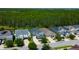 Beautiful aerial view of a neighborhood, showcasing well-maintained homes with lush landscaping at 14975 Renaissance Ave, Odessa, FL 33556