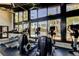 Featuring an array of treadmills and elliptical machines with scenic views, promoting an invigorating workout experience at 14975 Renaissance Ave, Odessa, FL 33556