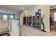 Bright hallway featuring stylish built-in shelving with accent decor at 14975 Renaissance Ave, Odessa, FL 33556