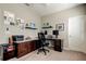 Office space with custom built-in desk and neutral wall color at 14975 Renaissance Ave, Odessa, FL 33556