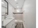 Modern bathroom featuring a new vanity, shower, and decorative tile accents at 1625 Fulton Ave, Clearwater, FL 33755