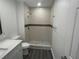 Modern bathroom featuring a tiled walk-in shower, stylish vanity, and updated fixtures at 1625 Fulton Ave, Clearwater, FL 33755