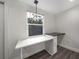 This bonus room has a built-in desk area and a window offering natural light at 1625 Fulton Ave, Clearwater, FL 33755