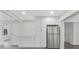 Updated kitchen features stainless steel appliances, granite countertops, and ample cabinet space at 1625 Fulton Ave, Clearwater, FL 33755