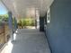 Spacious covered patio perfect for outdoor entertaining and relaxation at 1625 Fulton Ave, Clearwater, FL 33755