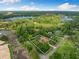 Aerial view of property in lush neighborhood surrounded by lakes at 17347 Linda Vista Cir, Lutz, FL 33548