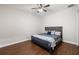 Simple bedroom offering ample space, wood flooring, and a serene atmosphere at 17347 Linda Vista Cir, Lutz, FL 33548