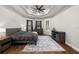 Spacious main bedroom with dark furnishings and wood floors at 17347 Linda Vista Cir, Lutz, FL 33548