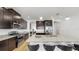 Gourmet kitchen with stainless steel appliances, granite countertops, a breakfast bar, and plenty of cabinet space at 17529 Buckingham Garden Dr, Lithia, FL 33547