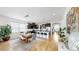 Bright open-concept kitchen and dining area featuring a large island with barstool seating at 17529 Buckingham Garden Dr, Lithia, FL 33547