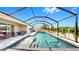 Beautiful swimming pool surrounded by a screened enclosure, offering a private and refreshing outdoor oasis at 17529 Buckingham Garden Dr, Lithia, FL 33547