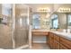 Bathroom with a walk-in shower, ample vanity space, and great mirrors at 19281 Stone Hedge Dr, Tampa, FL 33647