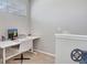 Upstairs office nook features a built-in desk, natural lighting, and a comfortable workspace at 19281 Stone Hedge Dr, Tampa, FL 33647