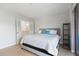 Comfortable main bedroom with ensuite bathroom, offering a peaceful sanctuary for rest and relaxation at 1935 Gulf Of Mexico Dr # G7-304, Longboat Key, FL 34228
