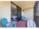 This cozy screened patio has bright seating and access to the interior bedroom at 1935 Gulf Of Mexico Dr # G7-304, Longboat Key, FL 34228