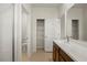 Bathroom featuring single sink vanity with access to shower and toilet at 2477 Water Willow Dr, Lutz, FL 33558