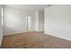 Bedroom with neutral carpet, white walls and trim, and window with view to the outdoors at 2477 Water Willow Dr, Lutz, FL 33558