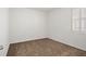 Carpeted bedroom with neutral walls, a window, and plenty of natural light at 2477 Water Willow Dr, Lutz, FL 33558