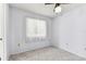Bedroom featuring a window, carpet, and neutral paint at 254 Timberview Dr, Safety Harbor, FL 34695