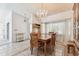 Formal dining room with tile floors, large dining table, and chandelier at 254 Timberview Dr, Safety Harbor, FL 34695