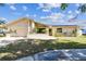 Exterior of a single Gathering home with an attached 2 car garage and American flag at 254 Timberview Dr, Safety Harbor, FL 34695