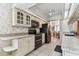 Charming kitchen with white cabinets, stainless steel appliances, and light countertops at 254 Timberview Dr, Safety Harbor, FL 34695