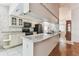 Bright, updated kitchen with granite counters and stainless steel appliances at 254 Timberview Dr, Safety Harbor, FL 34695