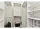 Walk-in closet with ample shelving and storage space at 254 Timberview Dr, Safety Harbor, FL 34695