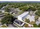 Aerial view of townhome complex in residential neighborhood with the city skyline in the distance at 3402 E 28Th Ave # 6, Tampa, FL 33605