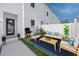 Cozy backyard with patio furniture, grill, and fresh landscaping for outdoor living at 3402 E 28Th Ave # 6, Tampa, FL 33605