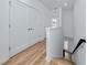 Hallway with modern floors and access to staircase at 3402 E 28Th Ave # 6, Tampa, FL 33605