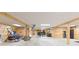 Spacious basement with concrete floors, wood-paneled walls, and ample room for entertaining at 34211 Blanton Rd, Dade City, FL 33523