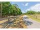 Long, private drive lined with mature trees leads to this beautiful country estate at 34211 Blanton Rd, Dade City, FL 33523