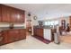 Traditional kitchen features granite counters, warm cabinetry, and modern appliances at 34211 Blanton Rd, Dade City, FL 33523