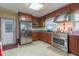 Well-equipped kitchen with stainless steel appliances, custom cabinetry, and ample countertop space at 34211 Blanton Rd, Dade City, FL 33523
